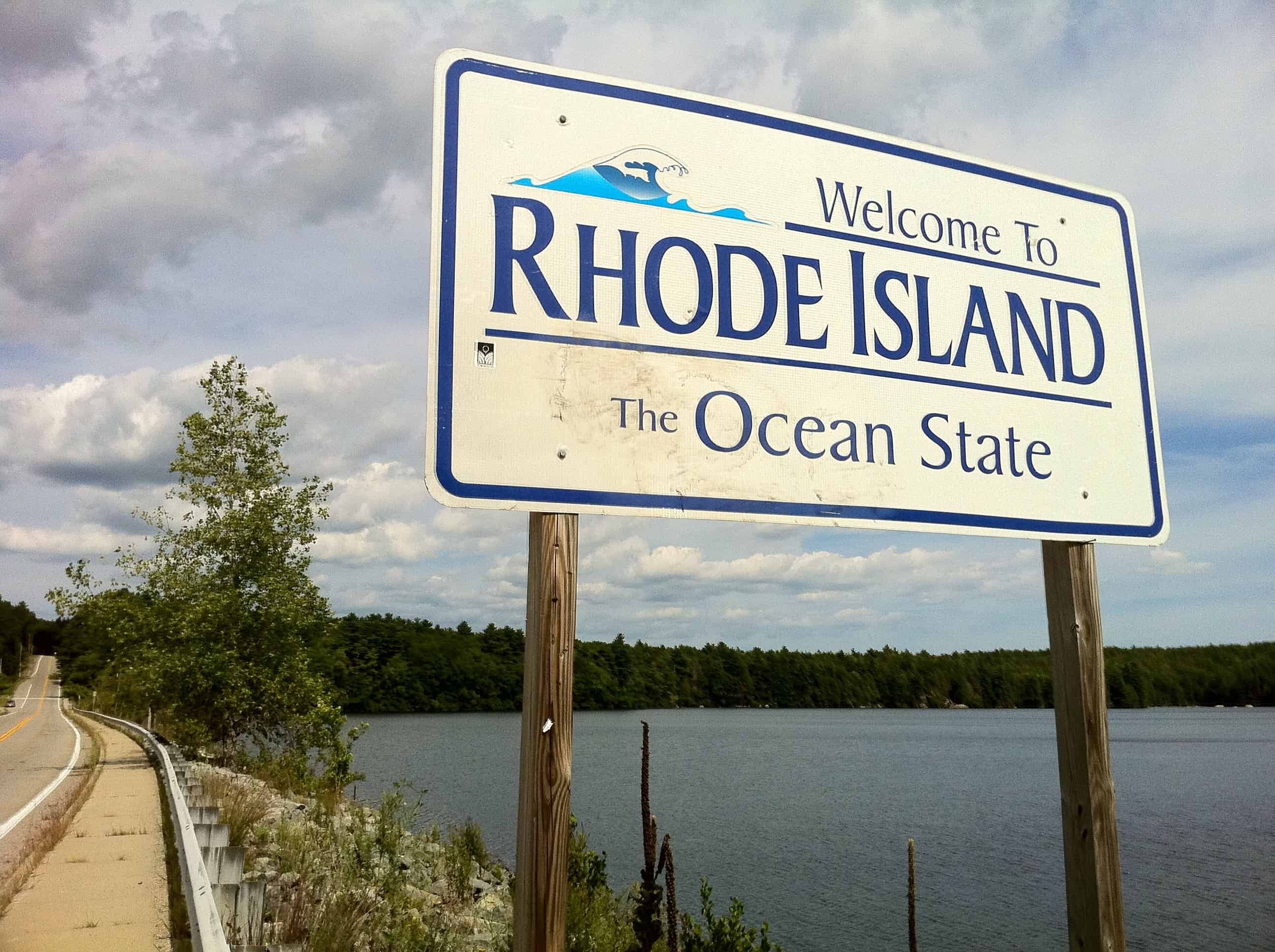 Pachaug Trail to Rhode Island sign” at Beach Pond, Hope