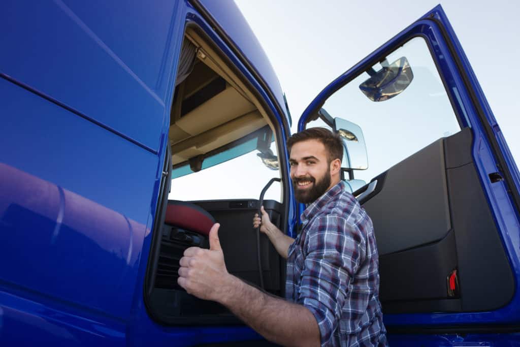 Auto Transport truck driver approves of delivery