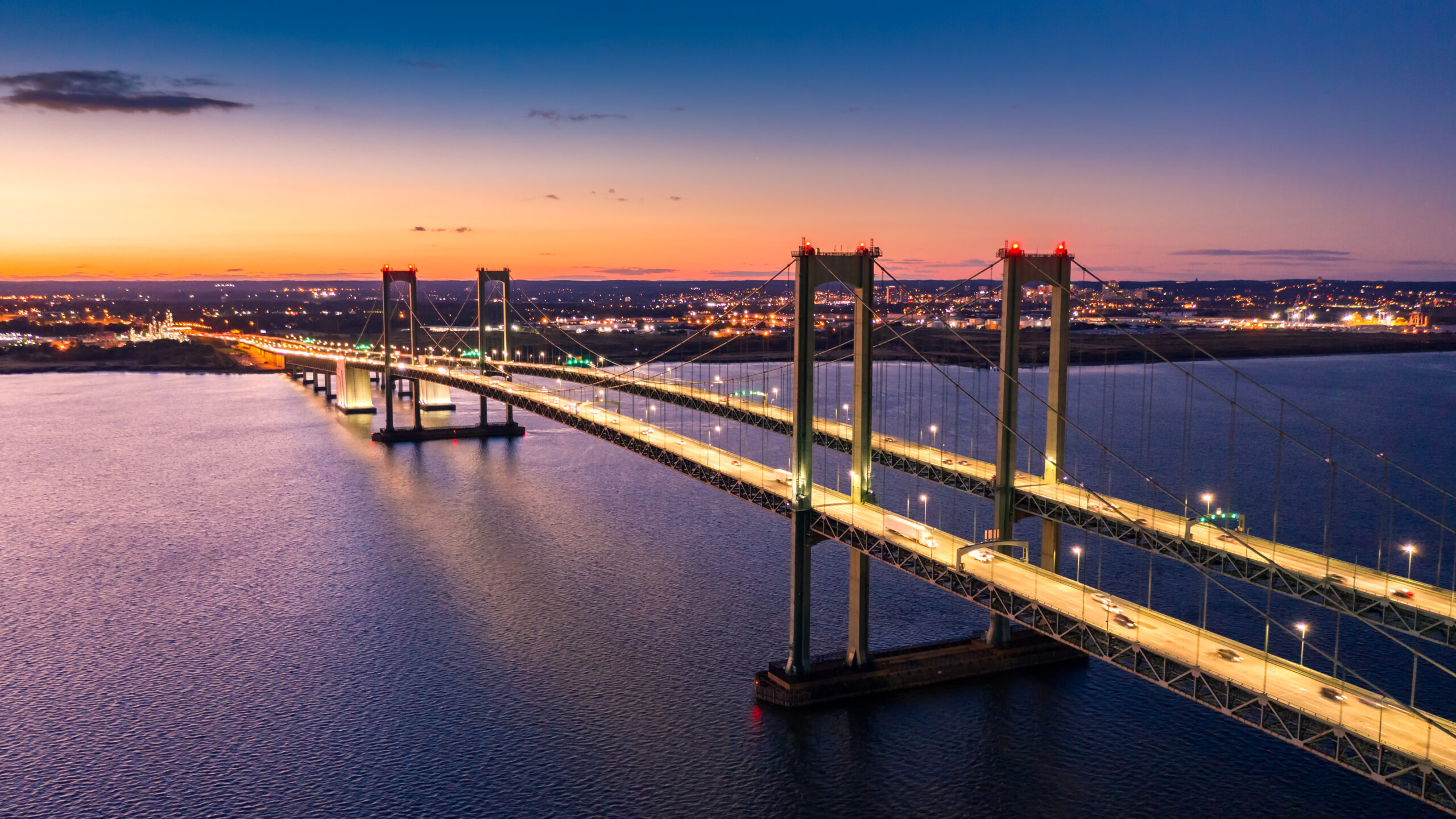 Car Shipping truck crossing the Delaware Bridge