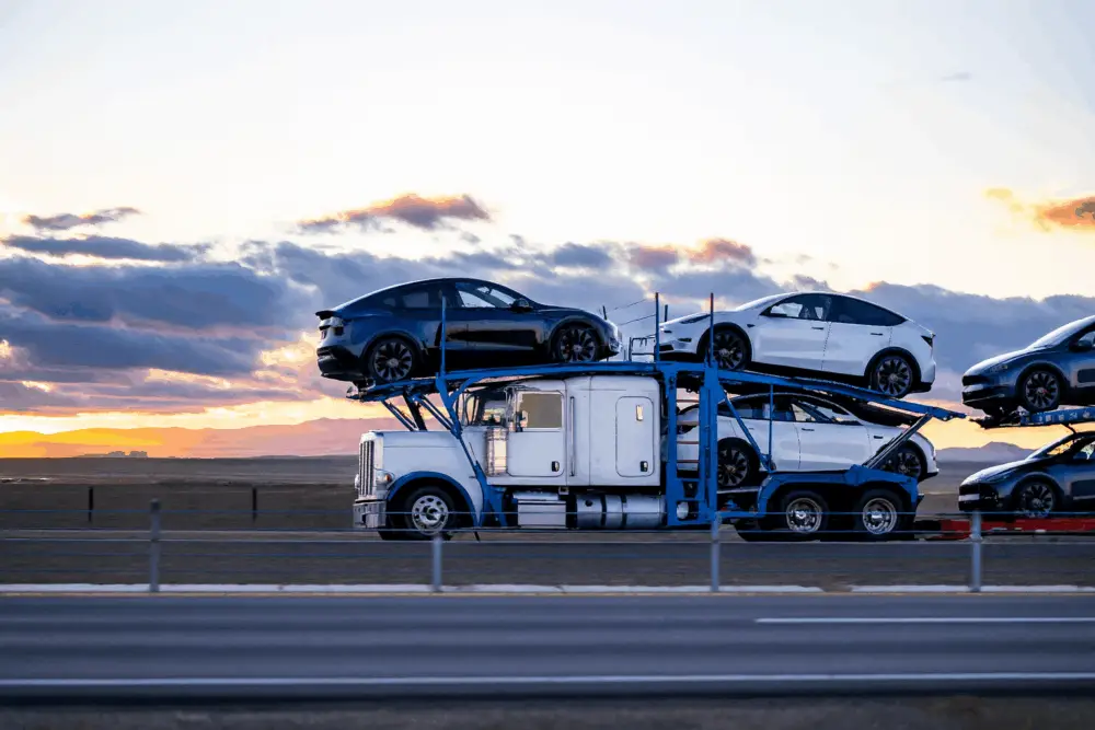 Smart Auto Move car transporters on a carrier